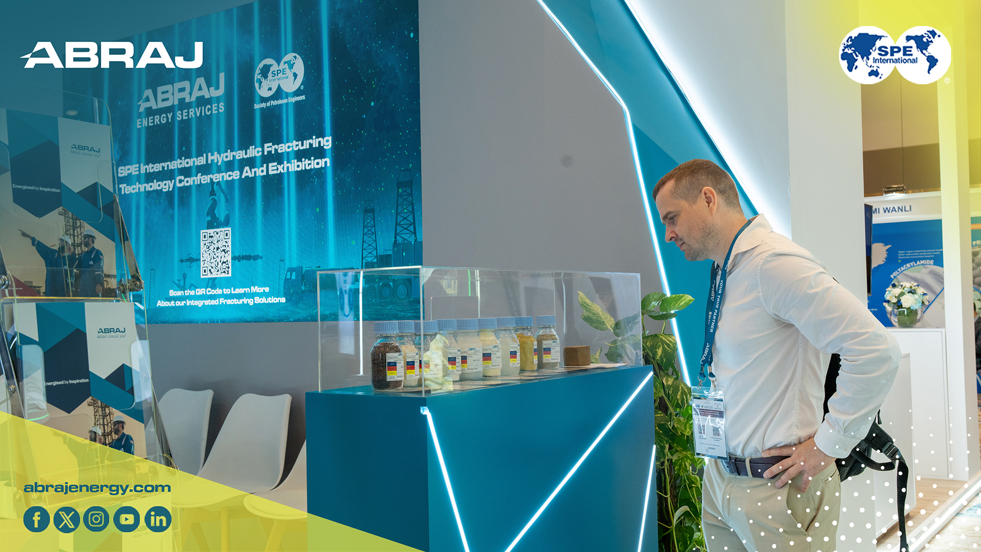 A visitor examines Abraj's showcased materials and fluids at the SPE Hydraulic Fracturing Exhibition 2025